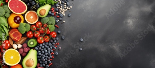 Various healthy foods arranged on a gray table Copy space image Place for adding text or design