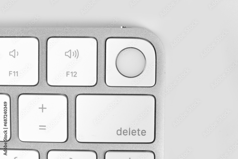 silver keyboard with fingerprint scanner on white background silver keyboard with fingerprint scanner on white background