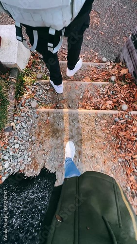 person walking in autumn park,woman, autumn, people, couple, wall, park, walking, person, outdoors, tourist, architecture, city, fall, stone, ancient, beauty, old, building, day, one, smile, fashion,  photo