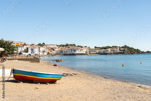 city ​​landscape on the costa brava in summer with white houses and boats photo