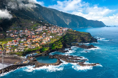 Fototapeta Naklejka Na Ścianę i Meble -  Aerial view of Madeira island. Land meets ocean in Seixal, Madeira, Portugal