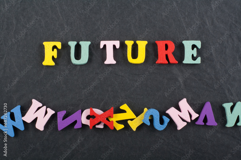 FUNURE word on black board background composed from colorful abc alphabet block wooden letters, copy space for ad text. Learning english concept.