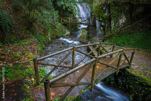 Fraga da Pena Waterfall trail in serra do Açor mountain, Portugal photo