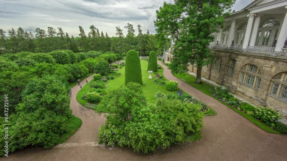 Garden near Antique Gallery and Sculptures: Catherine Park Timelapse in Saint-Petersburg, Russia. Exploring the Elegant Garden, Adorned with Floral Compositions, Trees and Bushes, on Cloudy Summer Day Garden near Antique Gallery and Sculptures: Catherine Park Timelapse in Saint-Petersburg, Russia. Exploring the Elegant Garden, Adorned with Floral Compositions, Trees and Bushes, on Cloudy Summer Day