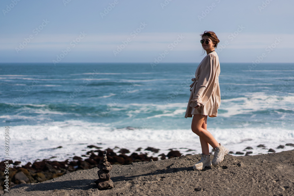 A girl walks on the ocean 