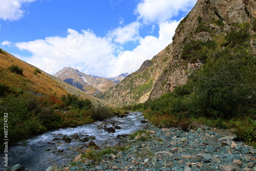 Fototapeta Naklejka Na Ścianę i Meble -  Eighth stage of Ak-Suu Traverse trek from Ala-kol lake to Karakol Gorge in Karakol national park, Kyrgyzstan