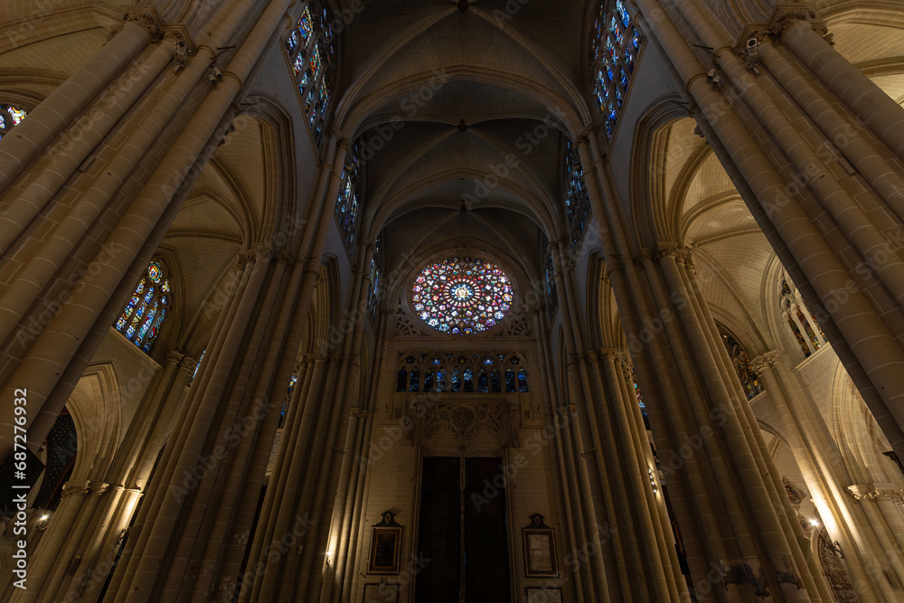 Interior of the Cathedral Santa Maria in Toledo, Spain. In its main nave in front of the door of forgiveness and its large rose window