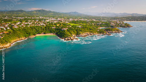 Puerto escondido Oaxaca Coastline aerial footage of sea ocean water waves in Mexico