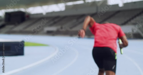 Fitness, relay and running sports for athletics, training or exercising in competitive race on the stadium track. Runner passing baton to athlete for sprinting, workout or practice for competition photo