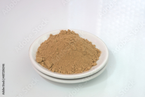 Zenzero in polvere usato in cucina come spezia da aggiungere in numerose ricette photo