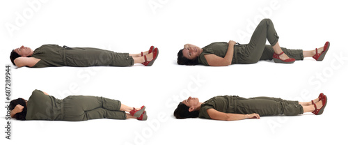 various poses of a group of same woman lying on the floor on white background photo