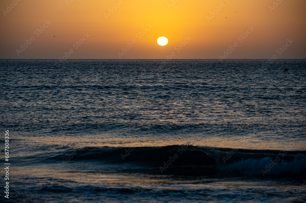 Sunrise over the Atlantic Ocean from Sotavento Beach, Costa Calma, Fuerteventura, Spain Sunrise over the Atlantic Ocean from Sotavento Beach, Costa Calma, Fuerteventura, Spain