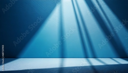 abstract blue background with drop shadow and light backdrop for product presentation