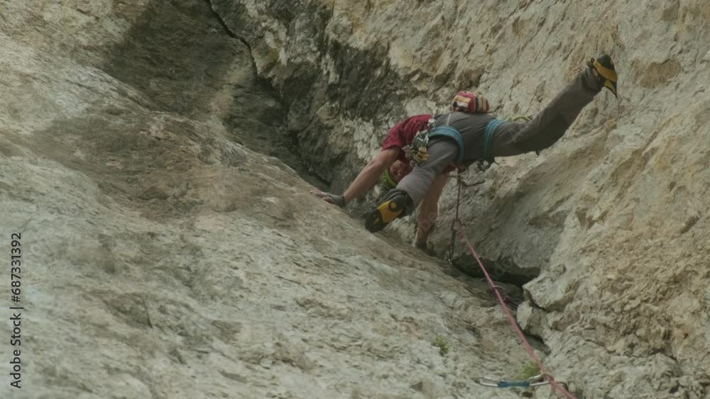 Scaling New Heights: A Thrilling Adventure of a Man Conquering the Mountain Scaling New Heights: A Thrilling Adventure of a Man Conquering the Mountain