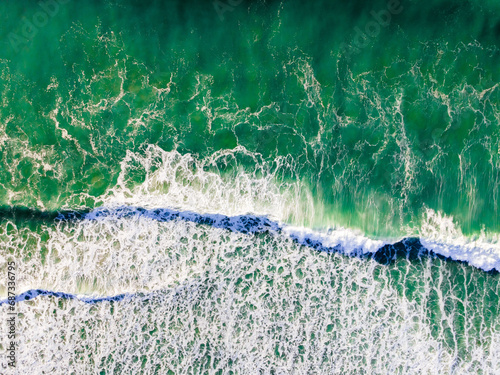 Aerial Serenity: Turquoise Waves from a Drone's Eye View – Perfect Graphic Design Background