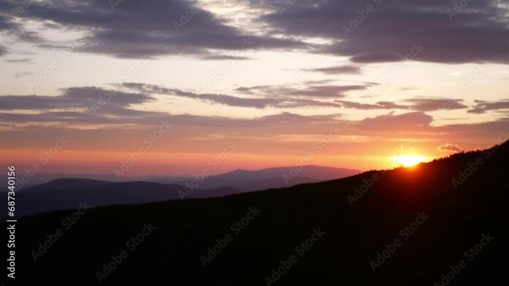 View of a mountain sunset in the Carpathians with pink sky. General shot in the frame, static shooting from a tripod. View of a mountain sunset in the Carpathians with pink sky. General shot in the frame, static shooting from a tripod.