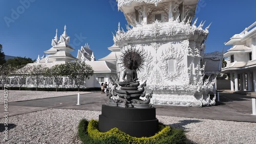 Chiang Rai, Thailand - November 27, 2023: White Temple or Wat Rong Khun is one of the landmark of Chiang Rai Province. It was created by Mr.Chalermchai Kositpipat, the famous Thai artist.