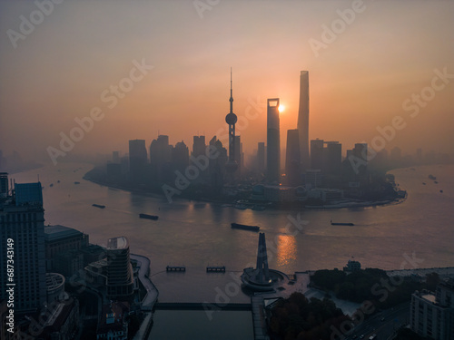 The drone aerial view of Lujiazui financial and trade zone at sunrise, Pudong, Shanghai, China. photo