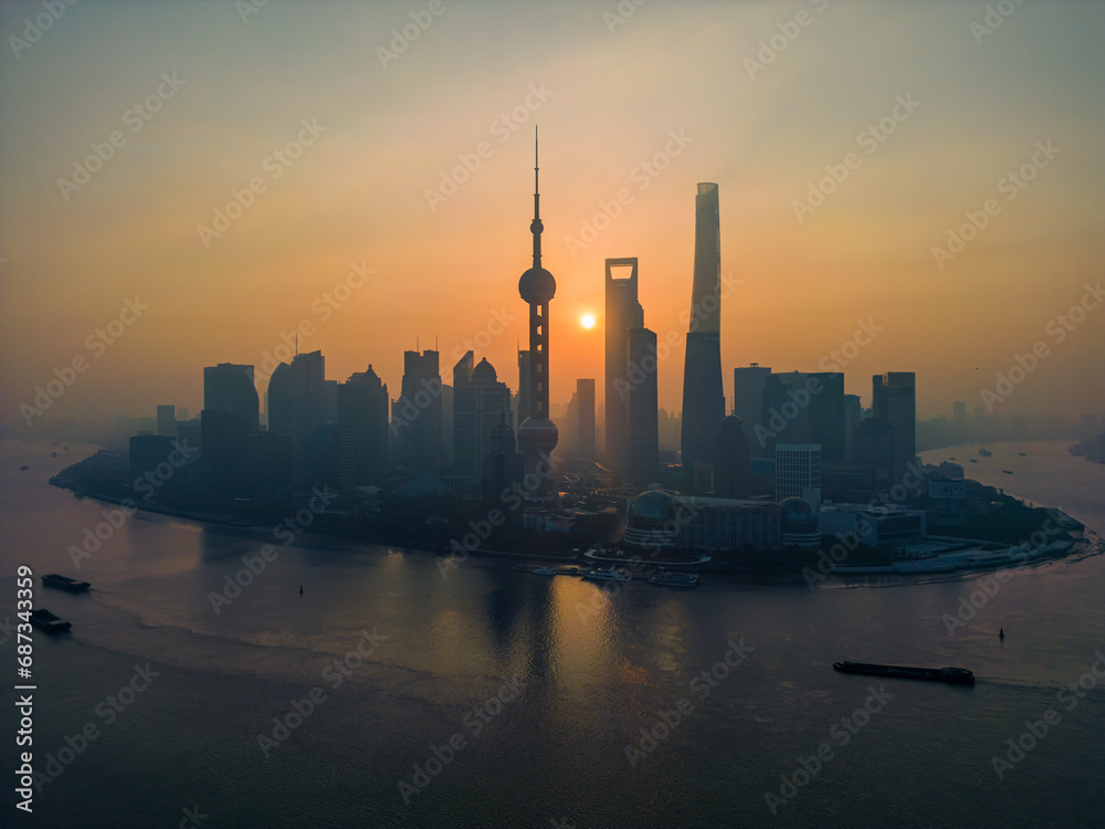 The drone aerial view of Lujiazui financial and trade zone at sunrise, Pudong, Shanghai, China.