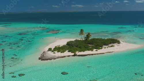 Wild tropical island sand beach, coral reef with turquoise water. Outdoor active lifestyle travel, summer holiday vacation. Beautiful exotic nature. Aerial drone shot