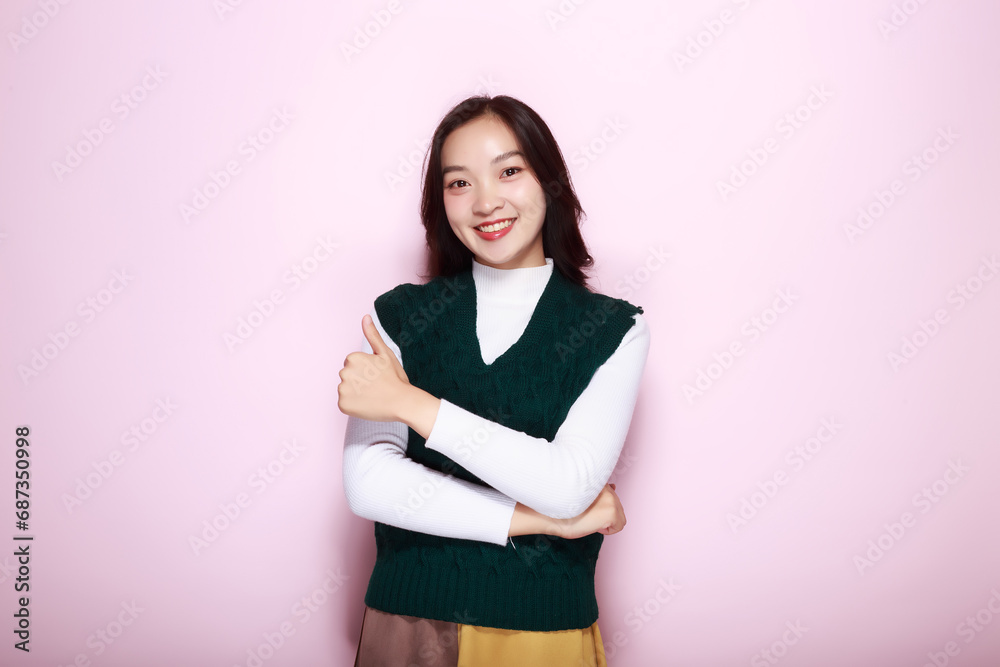 half body photo of nice positive lady crossed arms posing empty space ad isolated, Portrait of a friendly young woman smiling happily, Portrait of a beautiful young woman in a light pink background,