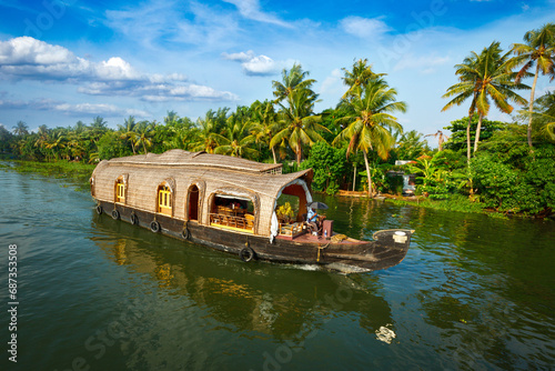 Tourism attraction of Kerala - tourist houseboat in Kerala backwaters. Kerala, India photo
