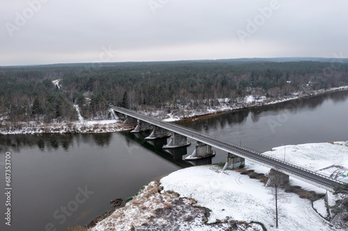 Aerial view of the bridge over the river and forest in a cloudy day, Lithuania © Krzysztof Bargiel
