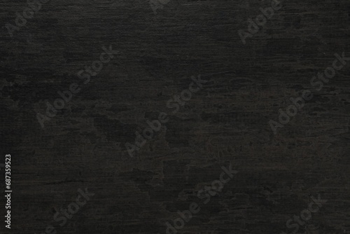 Texture of black stone surface as background, closeup