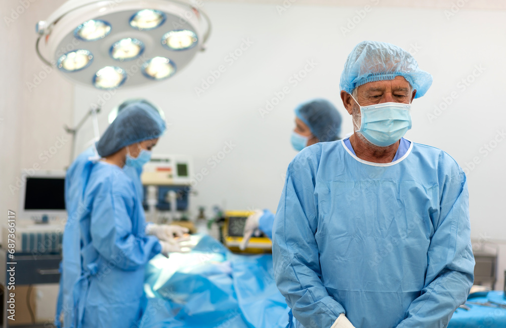 Professional anesthesiologist doctor medical team preparing patient to gynecological surgery operating with surgery equipment, save life, pain, surgical, hurt in hospital operation emergency room Professional anesthesiologist doctor medical team preparing patient to gynecological surgery operating with surgery equipment, save life, pain, surgical, hurt in hospital operation emergency room