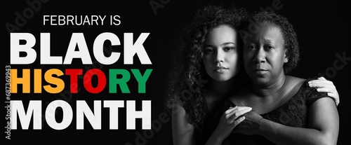 Portrait of African-American woman with her daughter and text FEBRUARY IS BLACK HISTORY MONTH on dark background photo