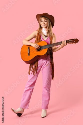 Young woman dressed as cowg...