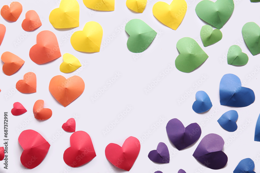Frame made of colorful paper hearts on white background. LGBT concept Frame made of colorful paper hearts on white background. LGBT concept