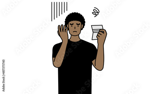 African-American man looking at his bankbook and feeling depressed.