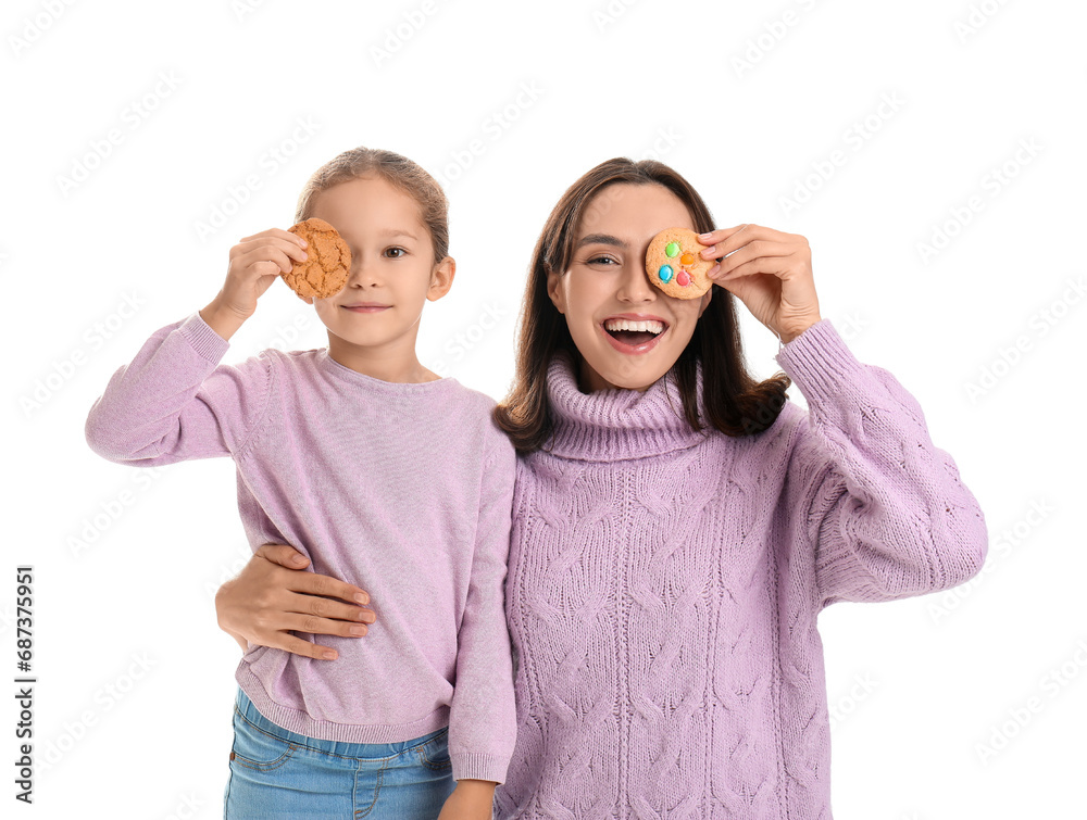 Funny mother and her little daughter with tasty cookies on white background Funny mother and her little daughter with tasty cookies on white background