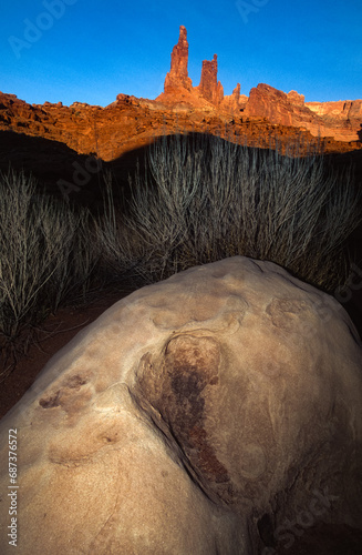 Boulder and sandstone towers at sunset in Canyonlands National Park, Utah photo