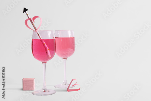 Two pink champagne glasses ...