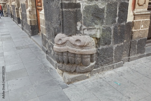 An Aztec serpent in the side of the Museum of the City of Mexico photo