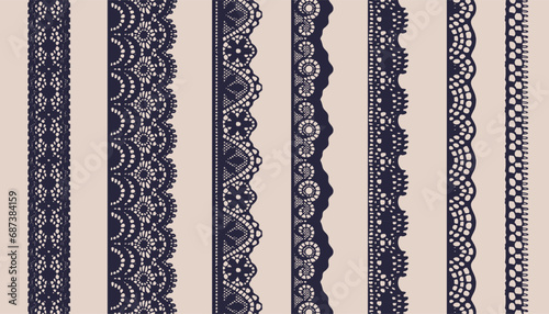 A set of seven dark-colored lace borders with different pattern styles. photo