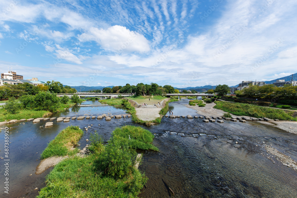 Fototapeta premium A delta of Kamo river with old stepping stones in Kyoto, Japan
