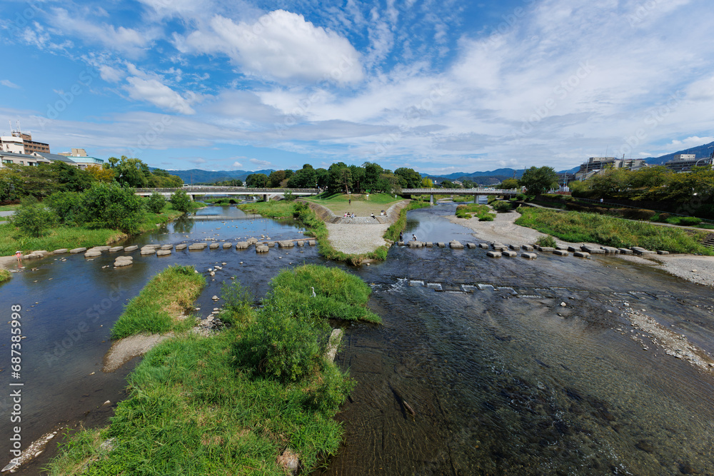 A delta of Kamo river with old stepping stones in Kyoto, Japan