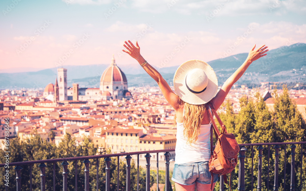 Happy woman tourist enjoys panoramic view of Florence cityscape- Italy