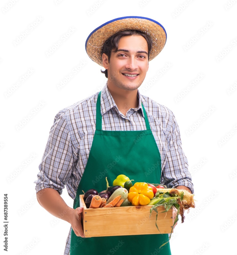 Young farmer with fresh produce isolated on white background Young farmer with fresh produce isolated on white background