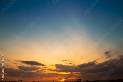 full sky with blue color along with clouds, Full sky in yellow color with rising of sun, Combination of blue and yellow sky