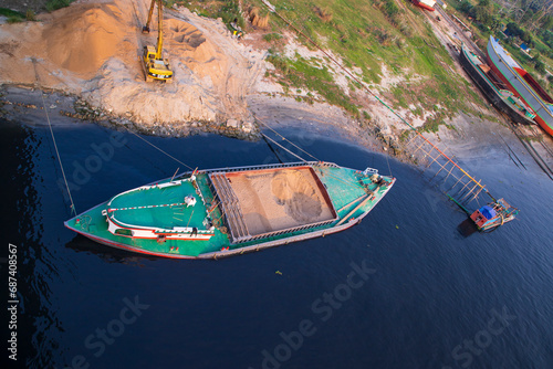 Top view of Sand bulkheads ships Waiting for unloaded in Sitalakhya River, Narayanganj, Bangladesh photo