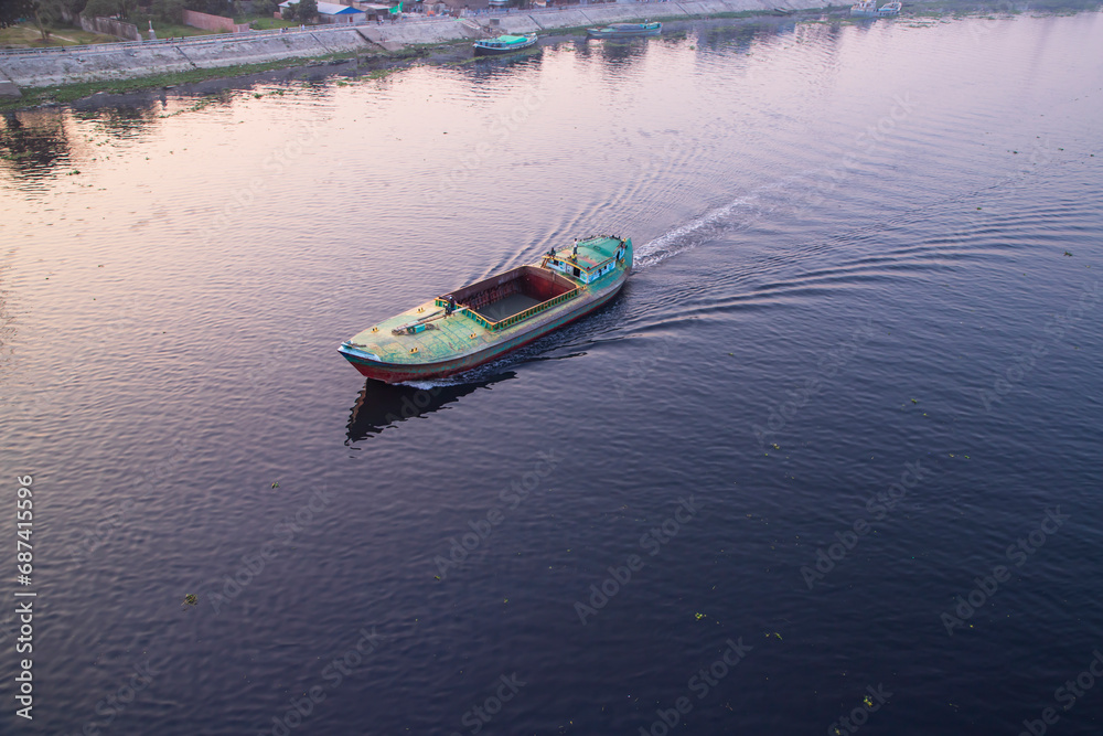 Obraz premium Aerial view Landscape of Sand bulkheads ships with Industrial zone in Sitalakhya River, Narayanganj, Bangladesh