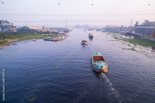 Aerial view Landscape of Sand bulkheads ships with Industrial zone in Sitalakhya River, Narayanganj, Bangladesh photo