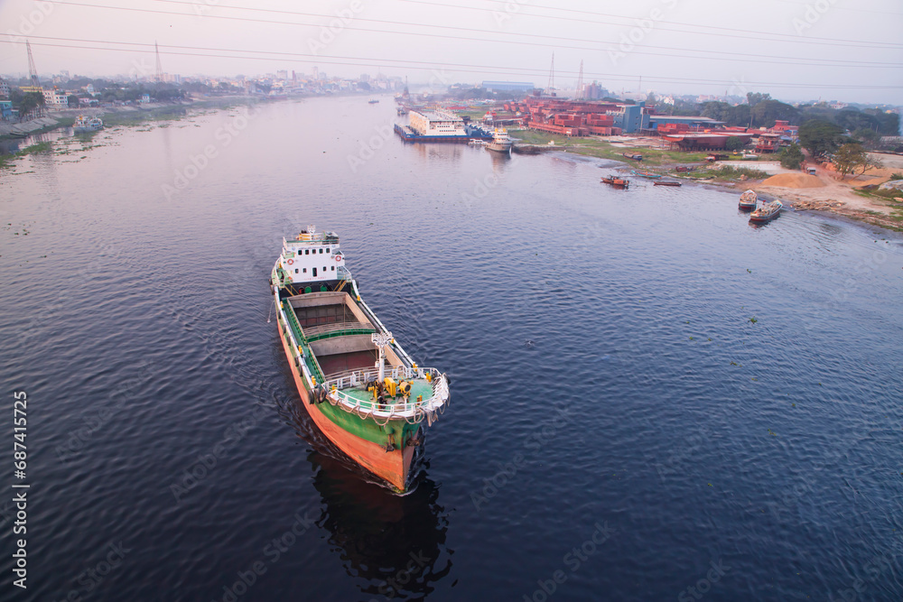 Fototapeta premium Aerial view Landscape of Sand bulkheads ships with Industrial zone in Sitalakhya River, Narayanganj, Bangladesh
