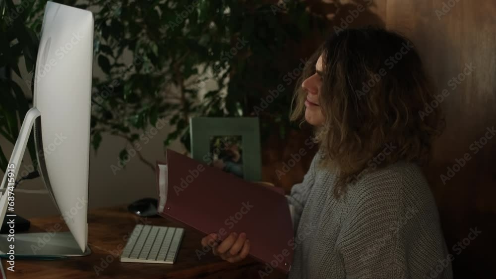 Upset woman is working at home on a computer. Upset woman is working at home on a computer.
