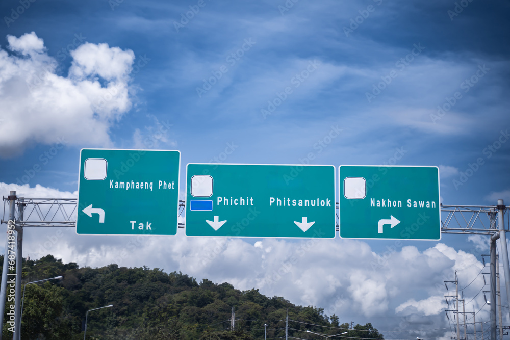 Highway with traffic signs with road signs ,Road trip concept