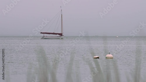 Red Boat in Nantucket Harbor Gray, Rainy Day